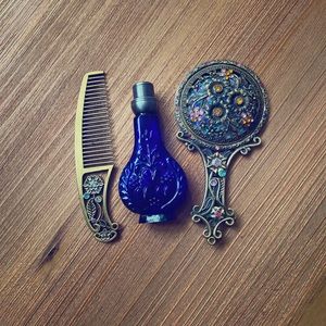 Hair comb mirror set with perfume bottle